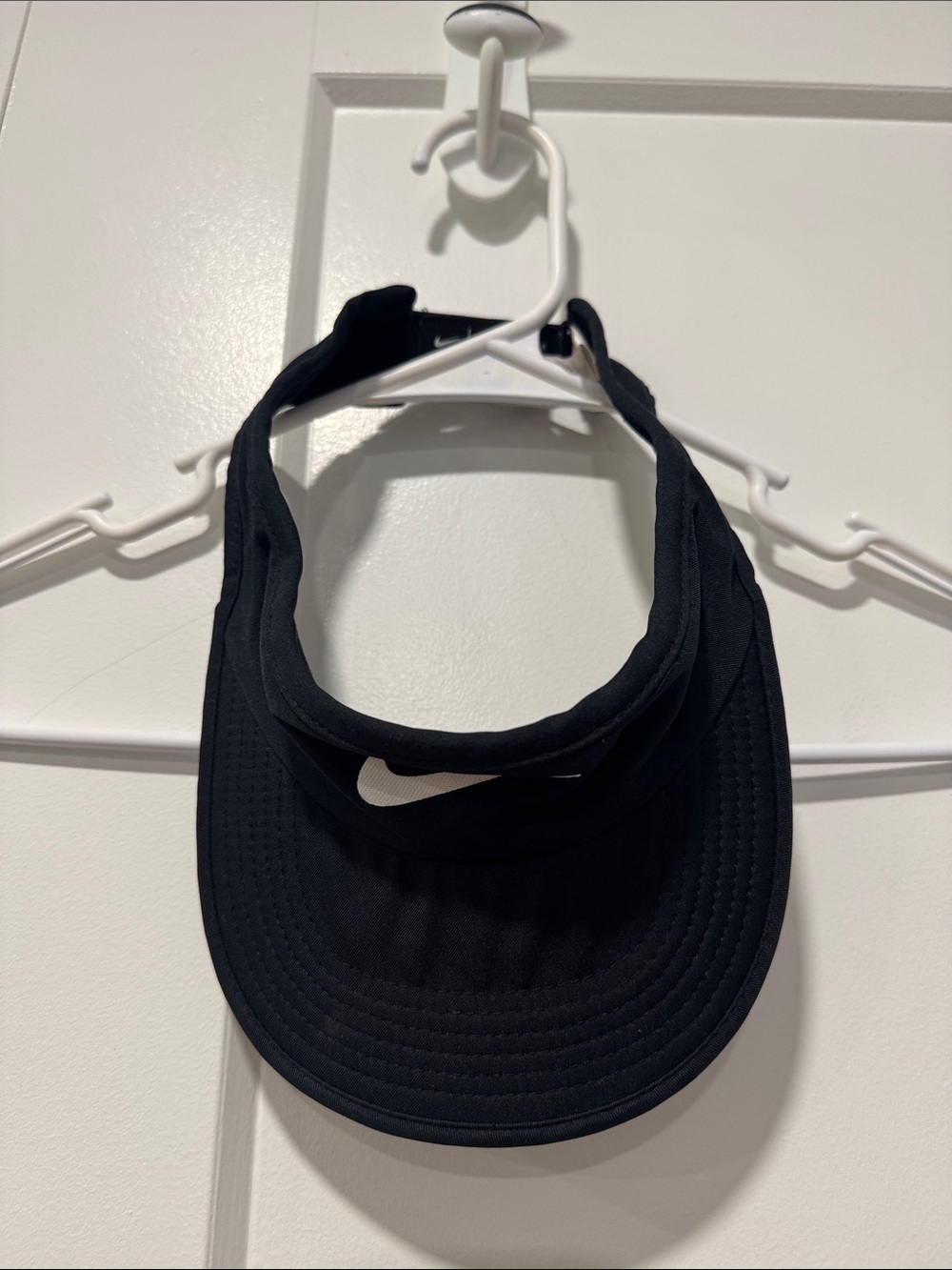 Nike Black Visor with White Swoosh Accent